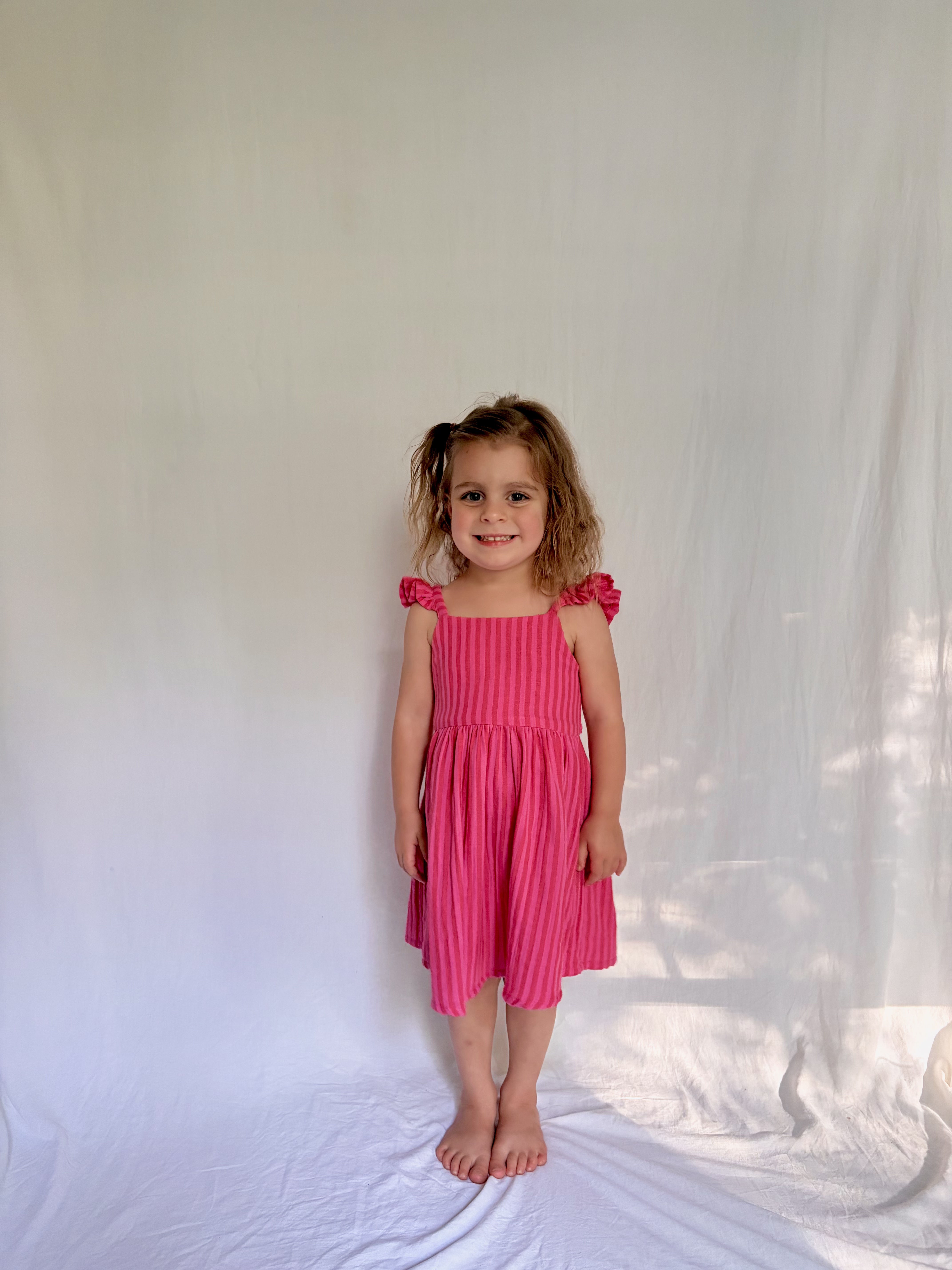 Pink Stripe Ruffle Dress in size 4 or 5